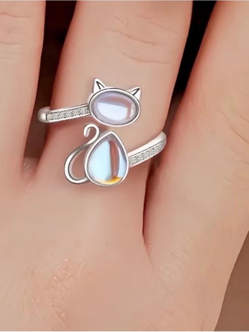 Silver Cat Wrap Ring with Iridescent Opal Stones.